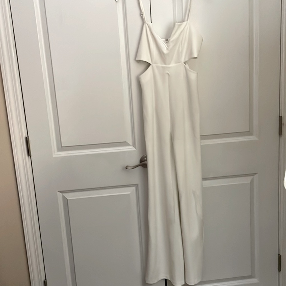 Forever 21 white jumpsuit with cut out sides